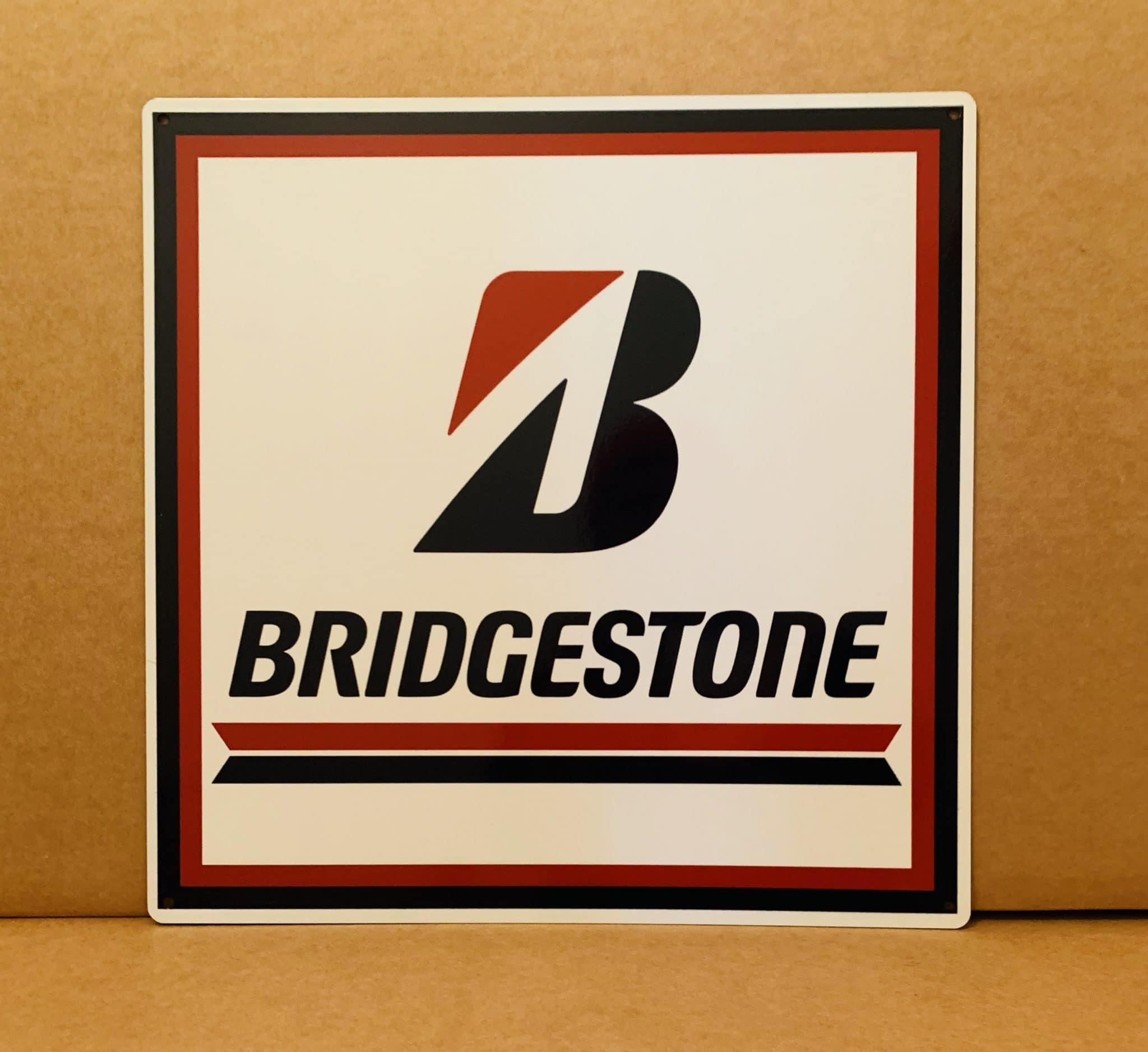 Bridgestone logo tin metal sign - Nostalgia Highway